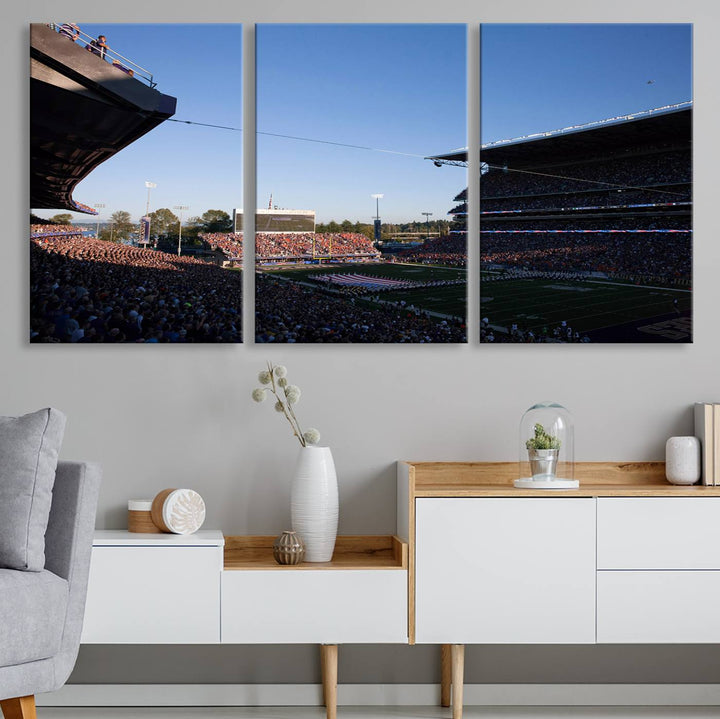 The University of Washington Huskies wall art print depicts Husky Stadium coming alive with fans as flags flutter.