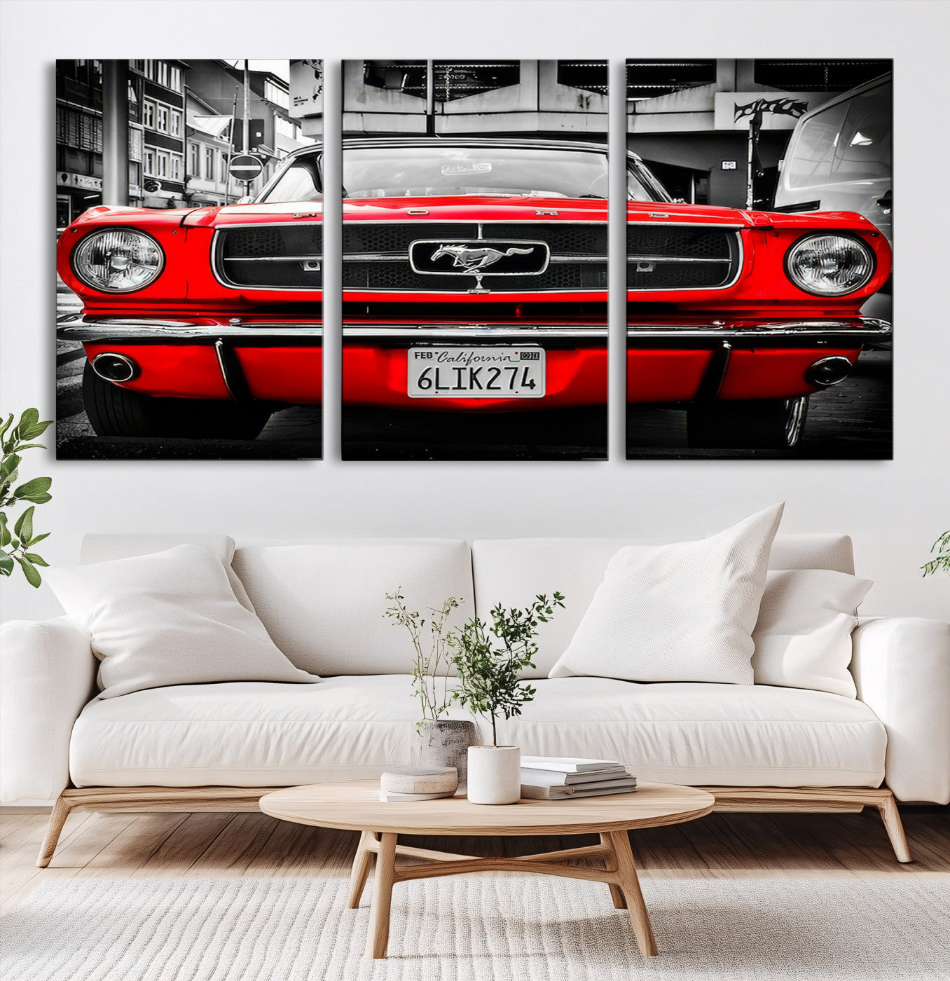 Front view of a bold red 1960s Ford Mustang parked in an urban environment, captured in dramatic contrast with a black-and-white city backdrop, emphasizing its timeless American muscle car identity.