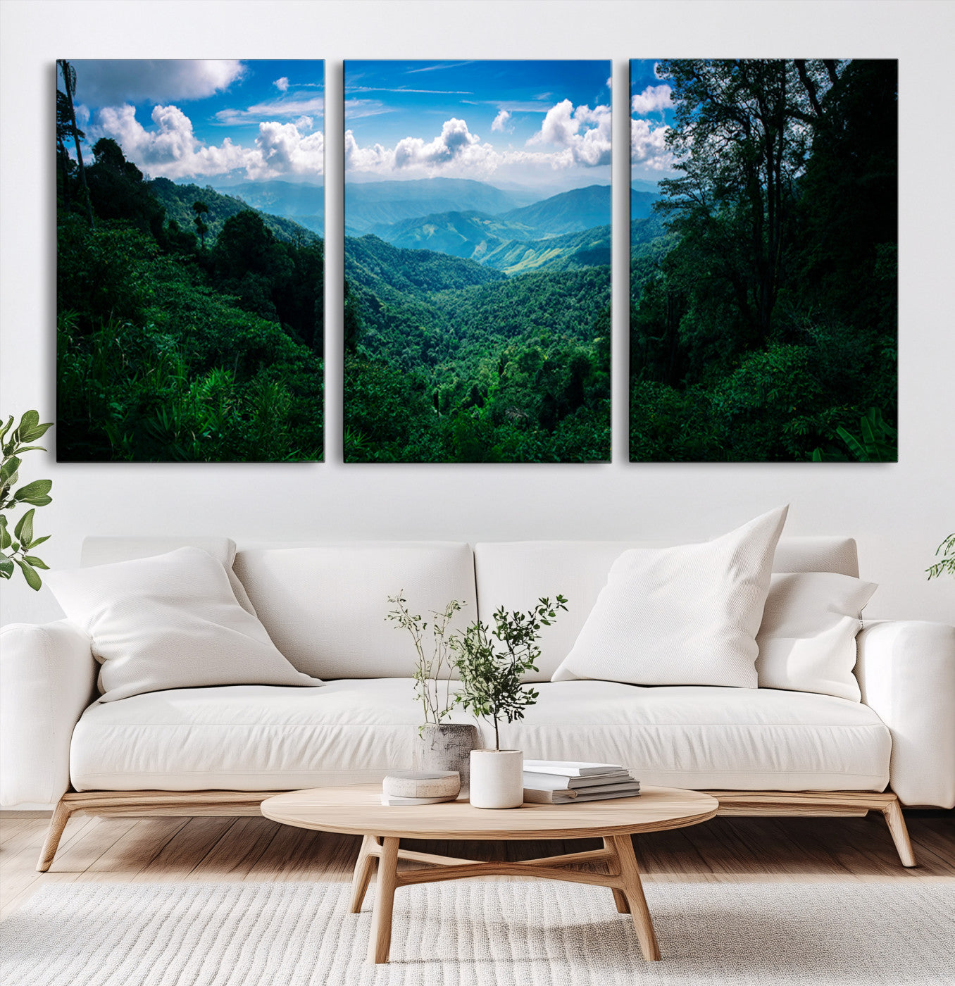 Canvas of a misty tropical jungle with vibrant greenery and layered blue mountains, ideal for exotic nature-themed wall décor.