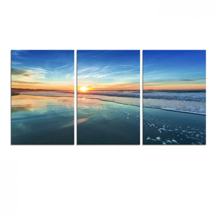 The Blue Sky and Beach Wall Art Canvas Print features a vibrant orange sky reflecting on wet sand.