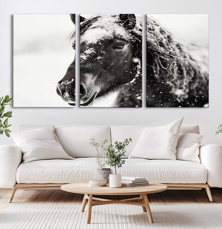 The wall art is a Black and White Horse piece, framed and ready to hang.