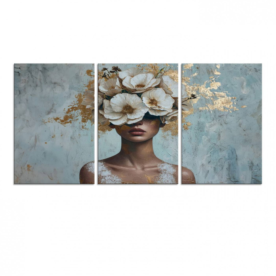 Golden Petal Wall Art: A womans face adorned with a gold floral design on a teal background, presented in a 3-panel modern glam canvas.