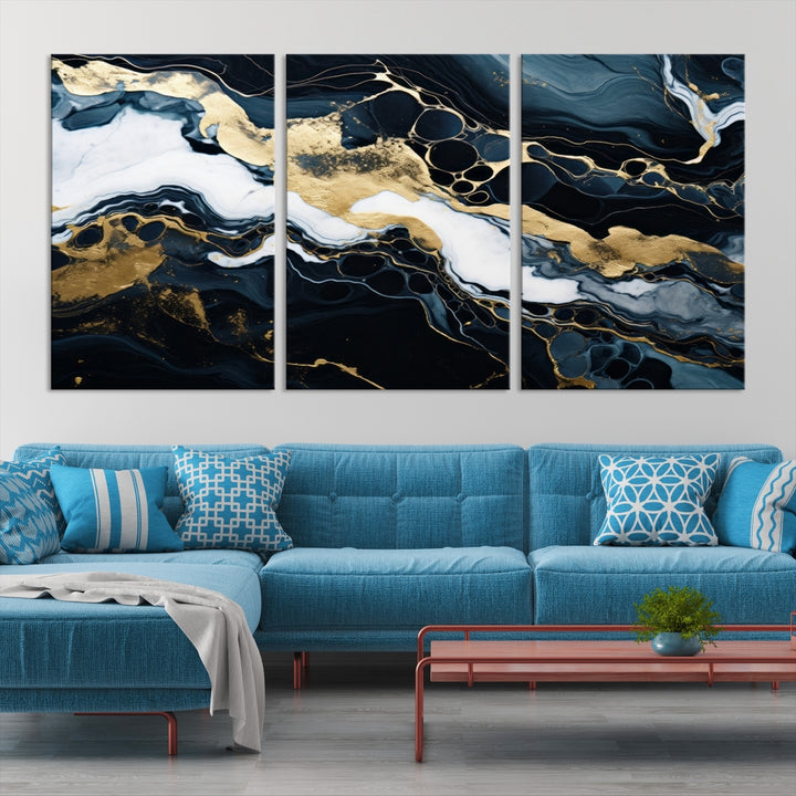 Fluid Marble Abstract Wall Art Print, a contemporary piece with black, white, and gold swirls on museum-quality canvas.