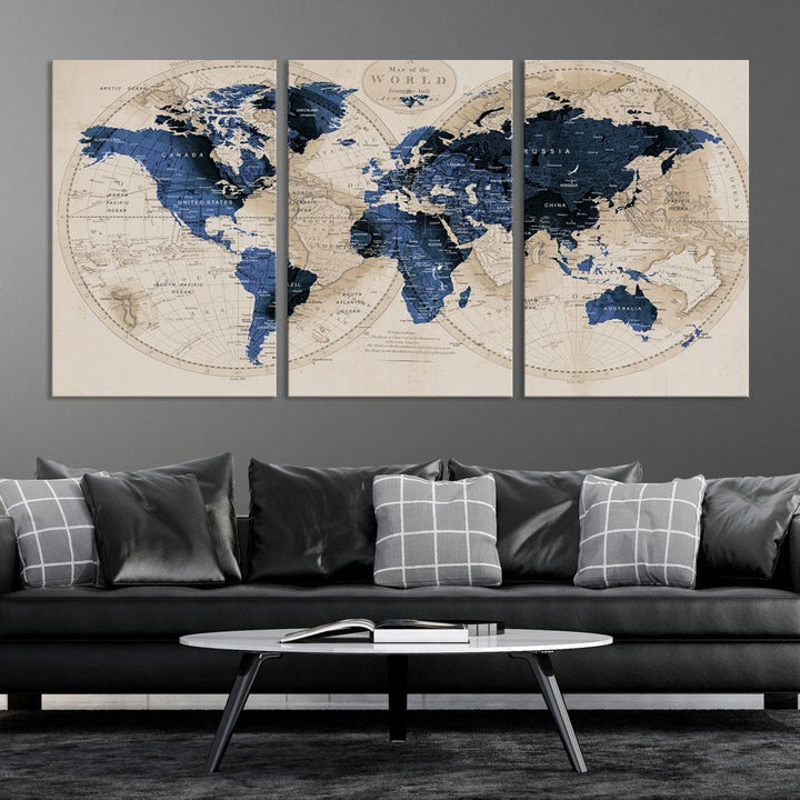 The Vintage Triptych Map Print is a grunge-stained blue and beige world map, perfect for enhancing wall decor.