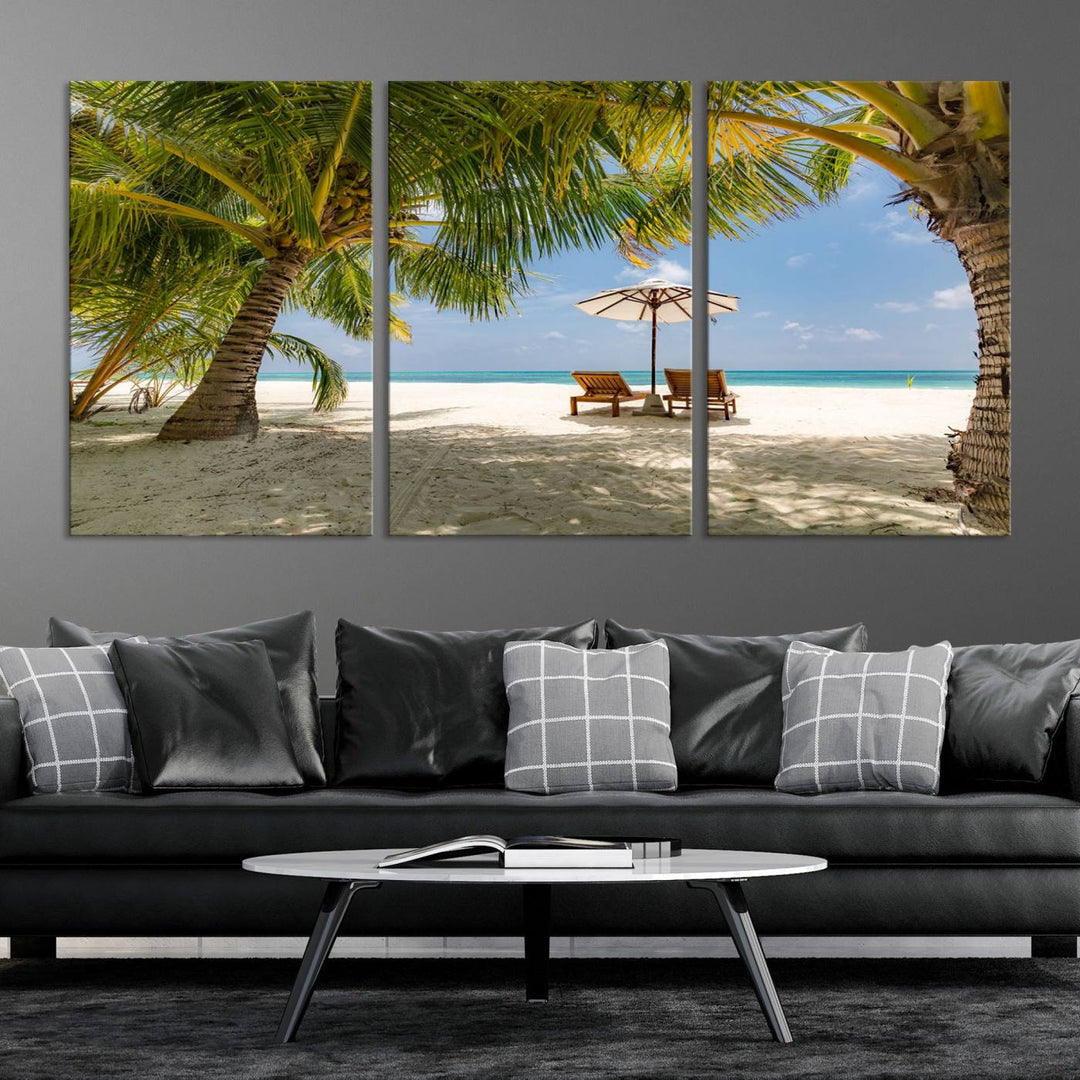 The canvas art print titled Lounge Chairs Palm Trees on Tropical Beach offers free shipping.