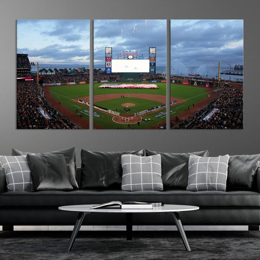 This framed 3-panel canvas MLB wall art features a giant flag and fans under a cloudy sky at Oracle Park.