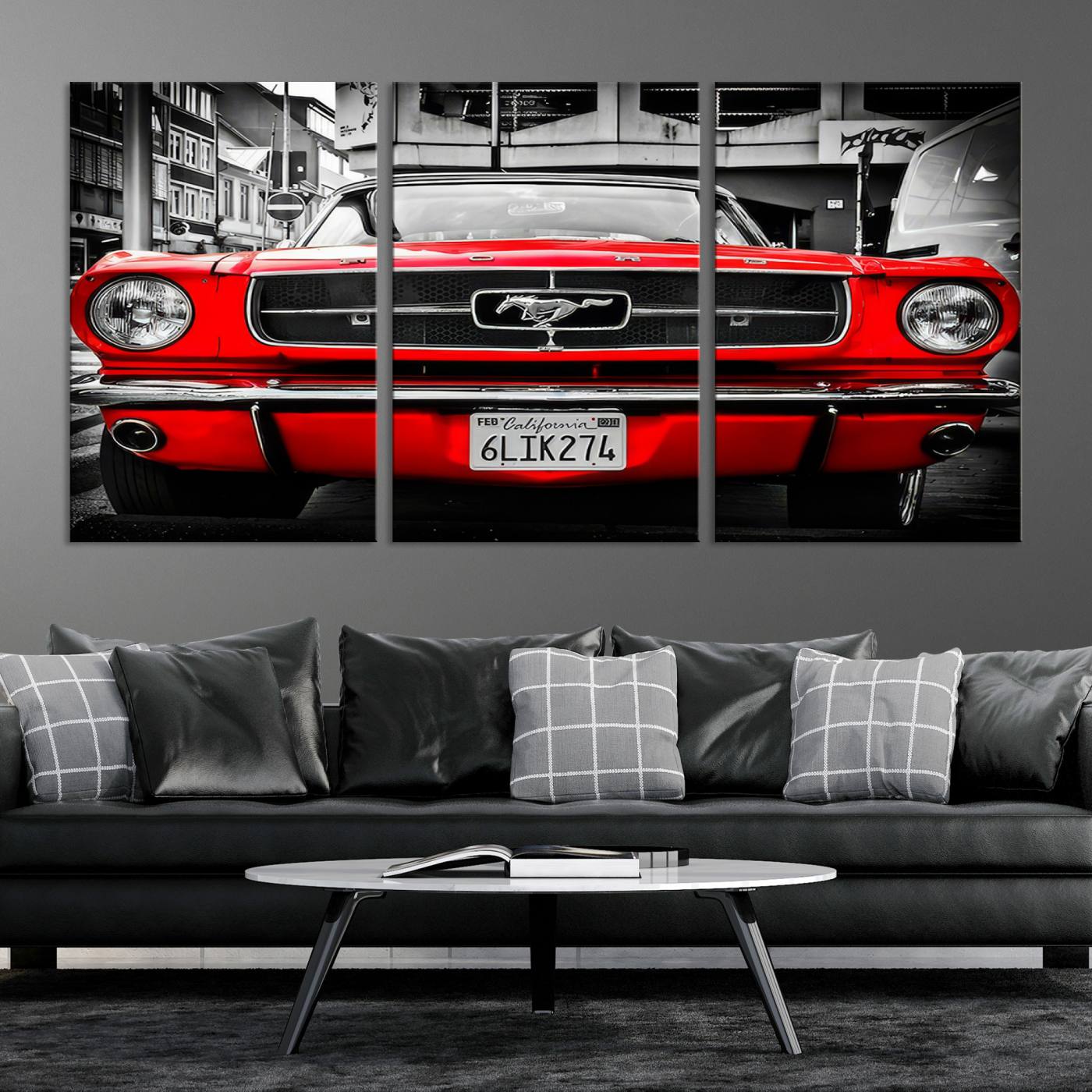 Front view of a bold red 1960s Ford Mustang parked in an urban environment, captured in dramatic contrast with a black-and-white city backdrop, emphasizing its timeless American muscle car identity.