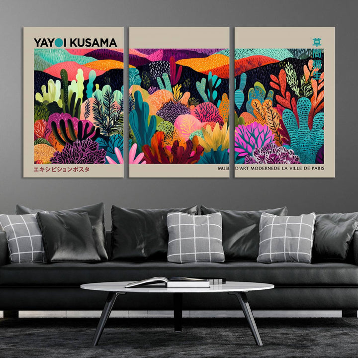 The framed Yayoi Kusama wall art adds vibrancy above the blue couch.