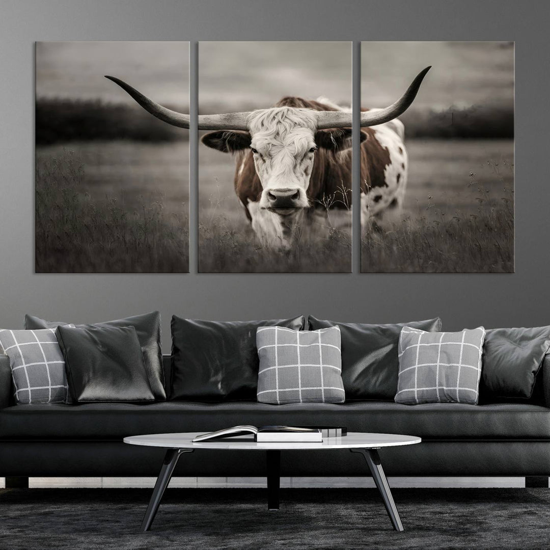 The Texas Longhorn Cow Canvas Wall Art Print adds a rustic touch to a living room.