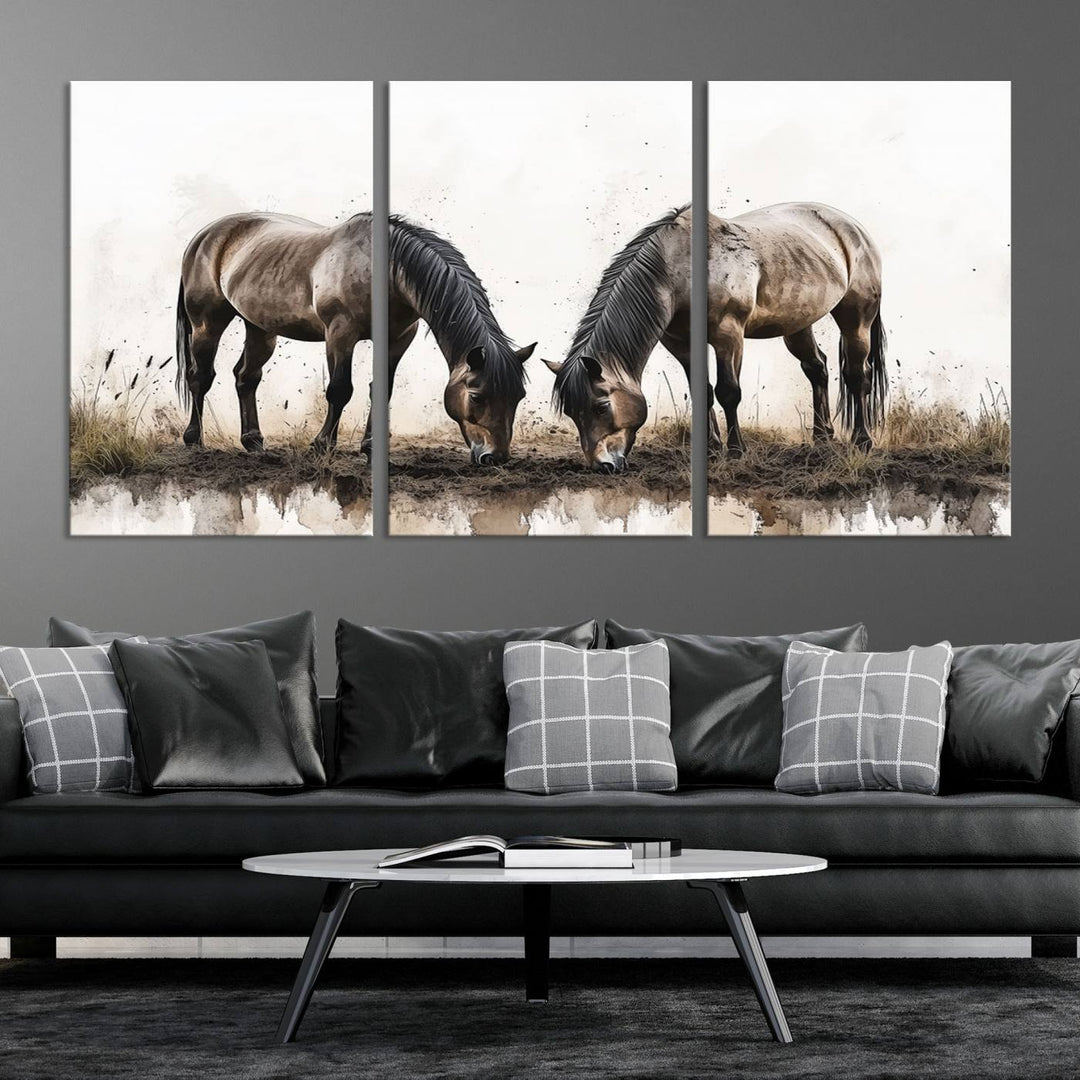 A Chinese Ink Style Horses Wall Art Canvas Print featuring two horses grazing is displayed in a modern setting.