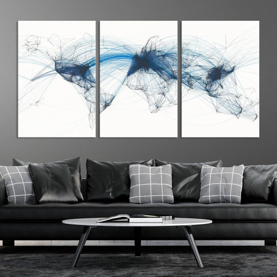 The Aviation Flight Map Wall Art is a set of three abstract panels featuring a world map with blue lines, resembling a flight map. Ideal for aviation enthusiasts, this ready-to-hang framed air traffic art print enhances the appeal of modern decor.