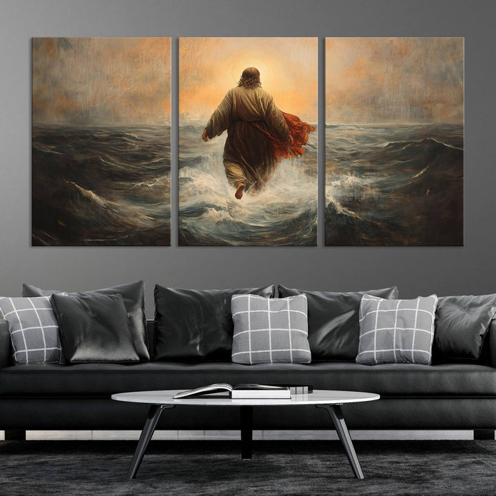 A modern living room is adorned with a triptych titled "Jesus Walking on Water, Christian Wall Art, Jesus Christ Walking on Oil Painting Style Print." The artwork, presented on museum-quality canvas, showcases vibrant colors and exquisite detail.