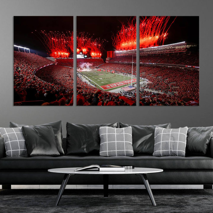 A vibrant red canvas art of a packed Ohio State Buckeyes stadium at night with fireworks.