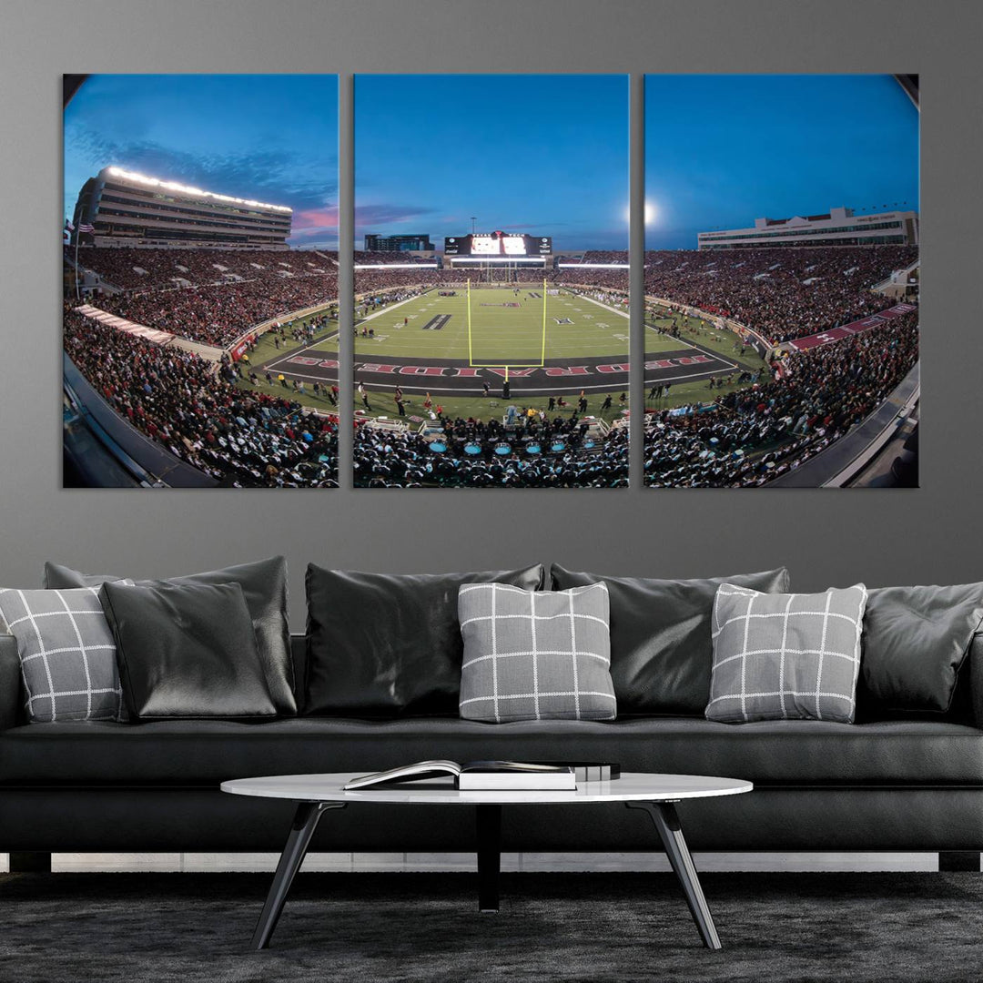 The wall art in the living room features a Texas Tech Red Raiders Football Team Print, showcasing Jones AT&T Stadium at dusk.