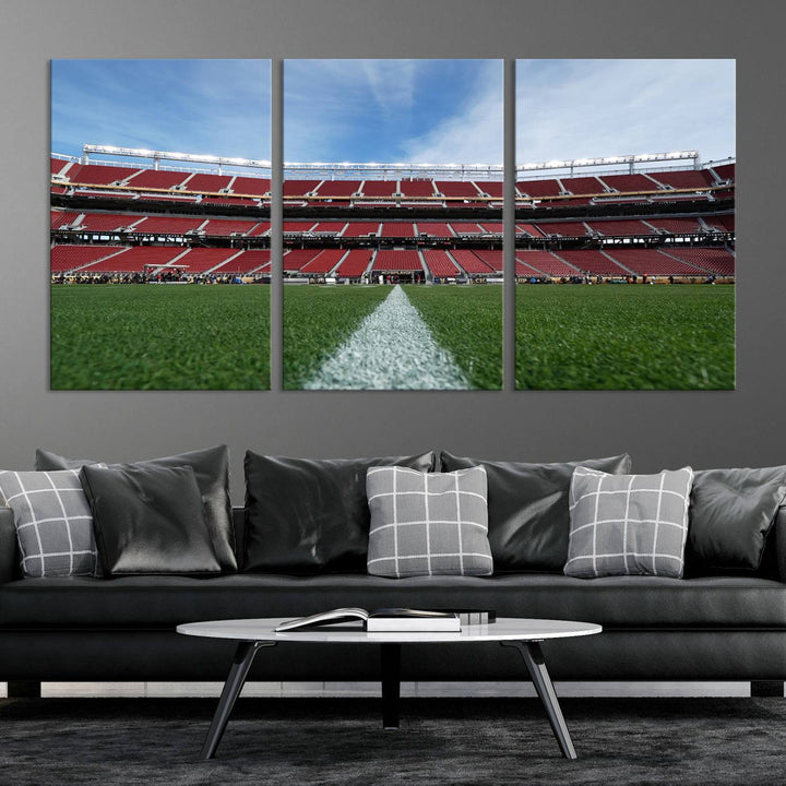 A canvas print of the University of Tulsa Golden Hurricane showcases H.A. Chapman Stadiums football field and red seats against a backdrop of a blue sky.