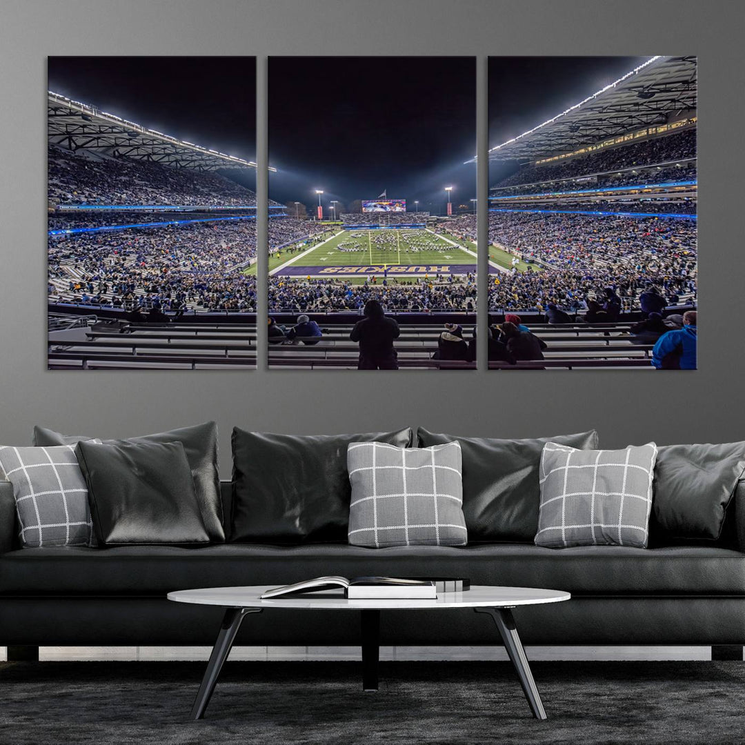 A canvas print titled The University of Washington Huskies Football depicts a packed Husky Stadium at night, as seen from the stands.