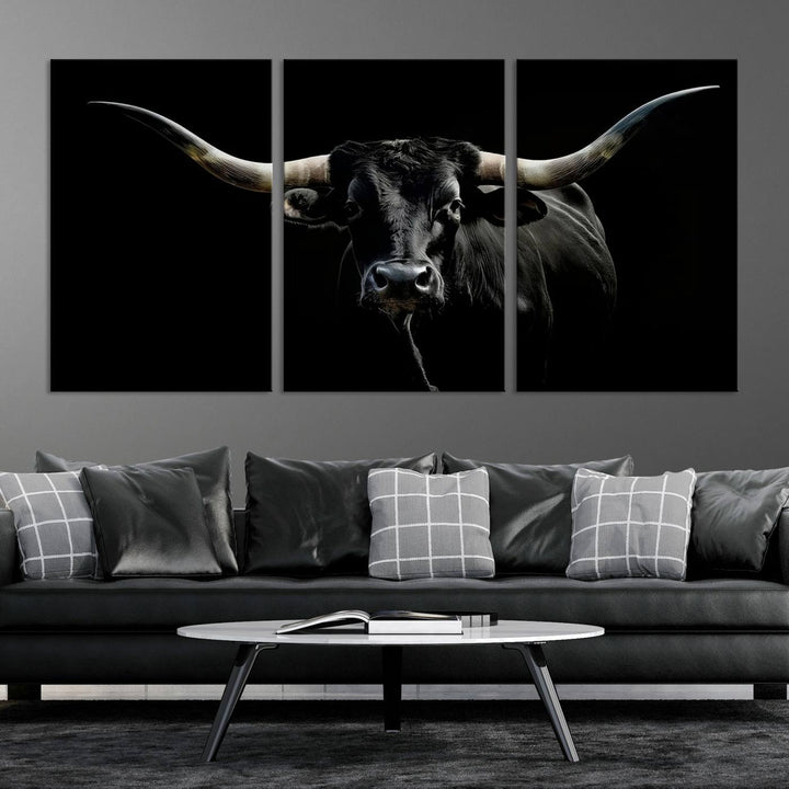 The Texas Black Longhorn Bull Canvas Print, featuring large curved horns set against a dark background, is ideal for Western decor.