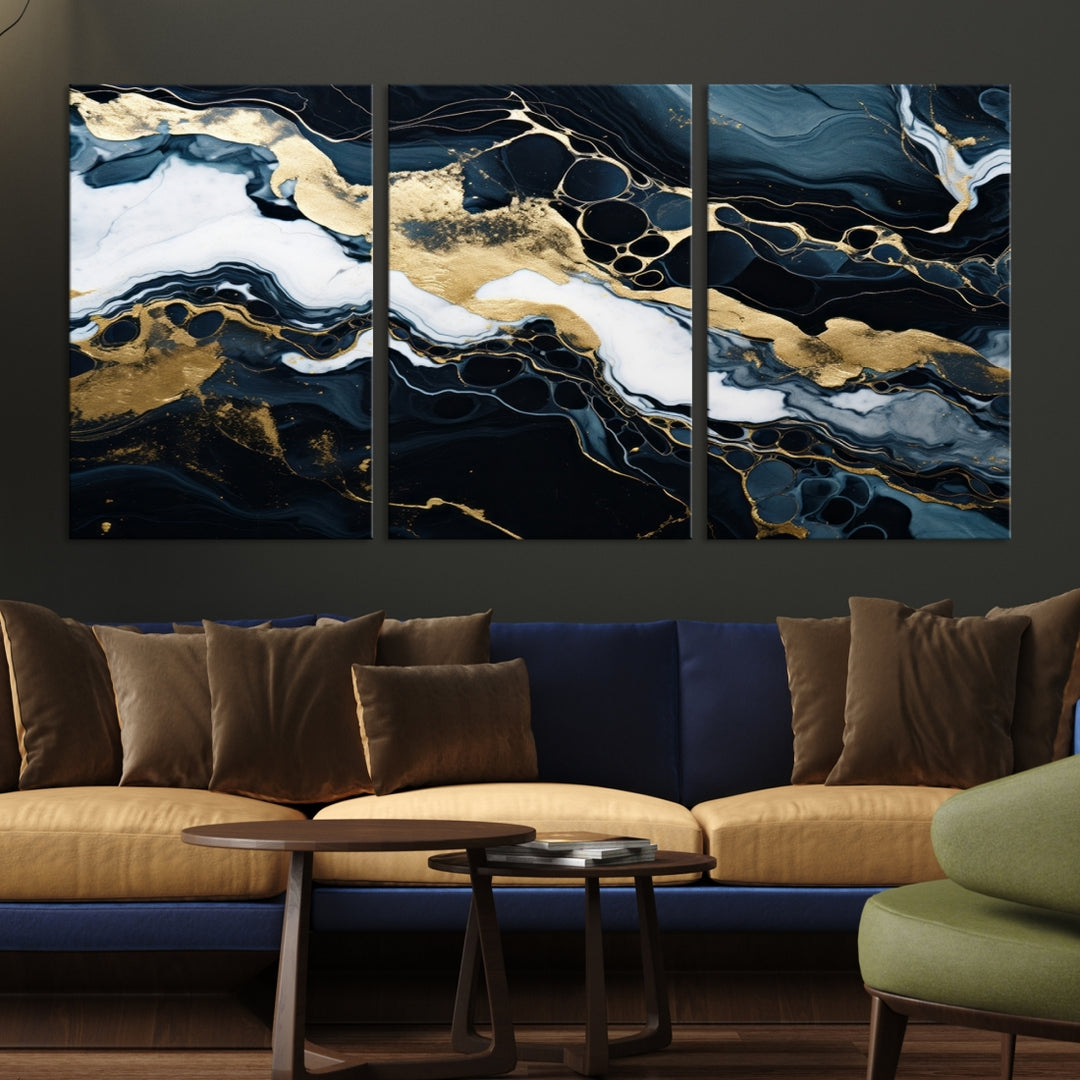 Fluid Marble Abstract Wall Art Print, a contemporary piece with black, white, and gold swirls on museum-quality canvas.