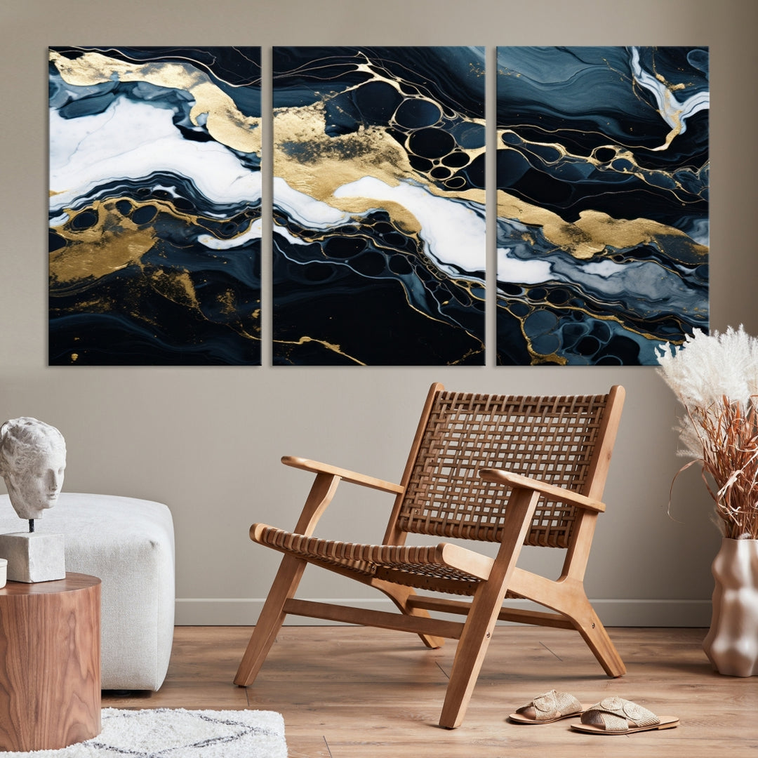 Fluid Marble Abstract Wall Art Print, a contemporary piece with black, white, and gold swirls on museum-quality canvas.