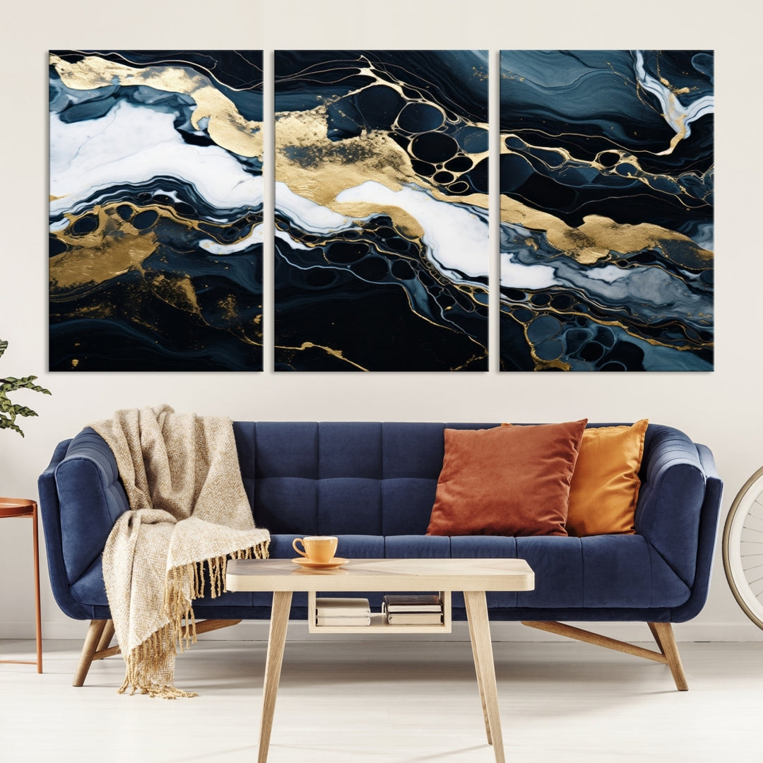 Fluid Marble Abstract Wall Art Print, a contemporary piece with black, white, and gold swirls on museum-quality canvas.