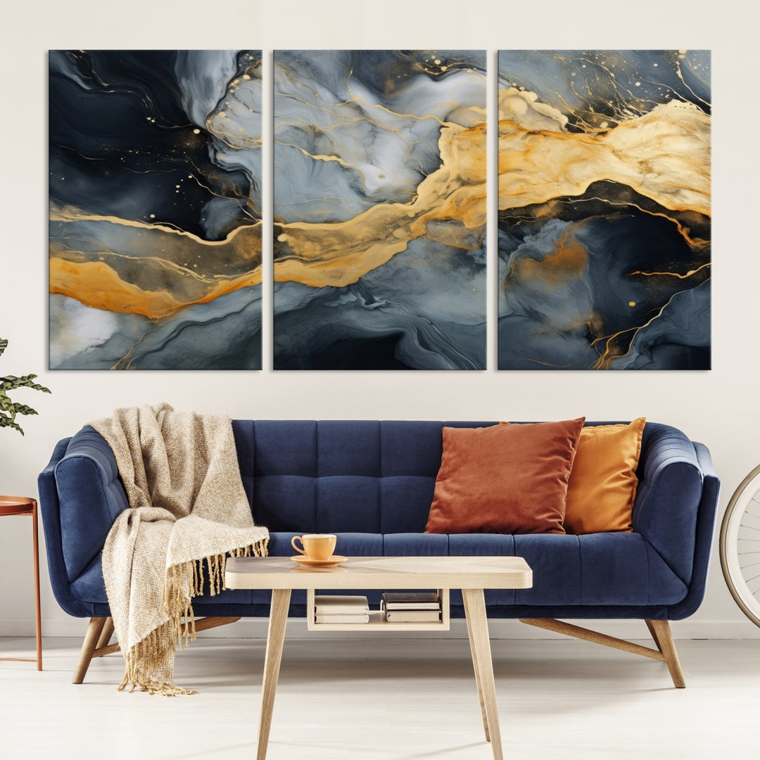 The living room features the Golden Gray Abstract Wall Art Print Contemporary Art Canvas Design, a triptych showcasing gold, black, and gray swirls. Crafted on museum-quality canvas and ready to hang, this piece is designed for elegance and durability.