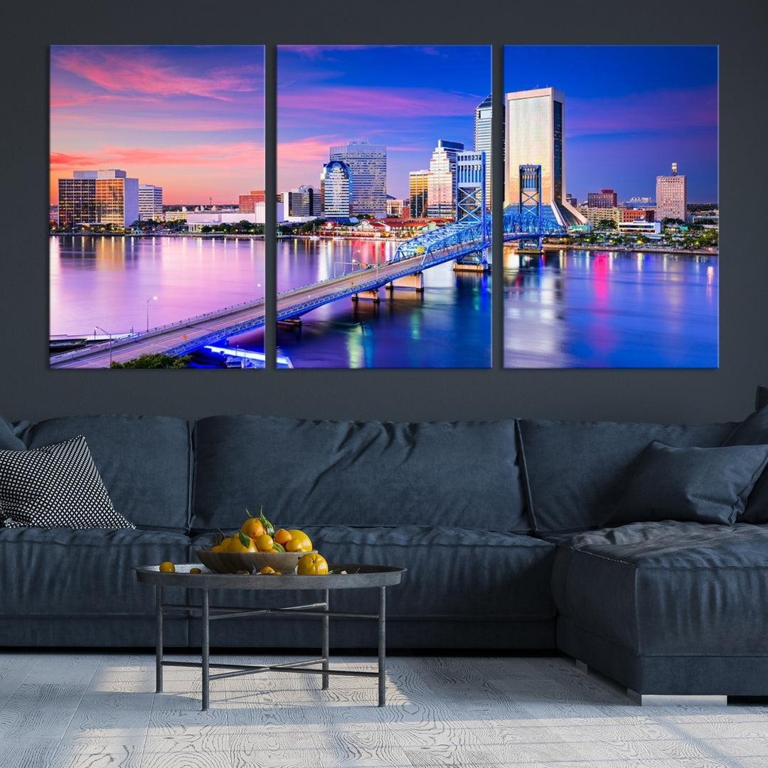 The Jacksonville Wall Art Canvas Print, showcasing the Jacksonville cityscape over a river at sunset, is elegantly crafted on museum-quality canvas with a UV-protective coating. Ready to hang, it elevates your space with its sophisticated charm.