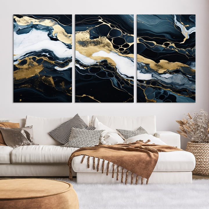 Fluid Marble Abstract Wall Art Print, a contemporary piece with black, white, and gold swirls on museum-quality canvas.