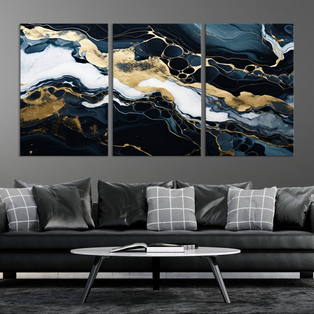 Fluid Marble Abstract Wall Art Print, a contemporary piece with black, white, and gold swirls on museum-quality canvas.