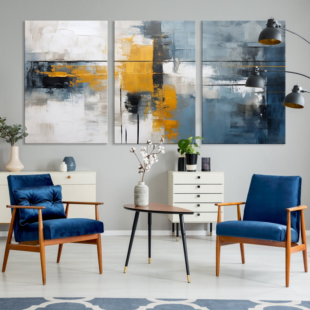 The Orange Abstract Wall Art Print features a series of white, blue, black, and yellow blocks arranged in a triptych format on museum-quality canvases. Proudly made in the USA and offered with free shipping.