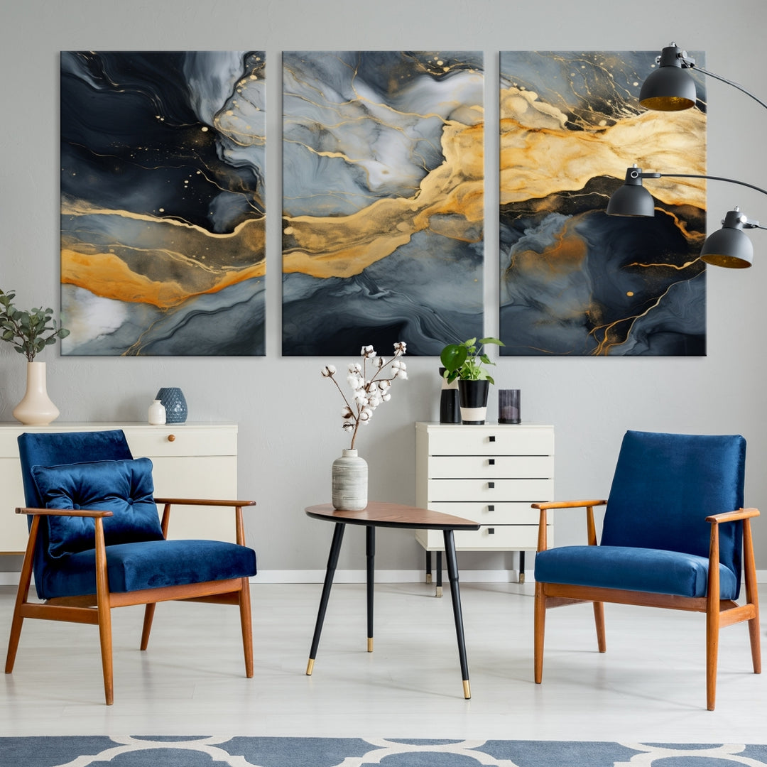 The living room features the Golden Gray Abstract Wall Art Print Contemporary Art Canvas Design, a triptych showcasing gold, black, and gray swirls. Crafted on museum-quality canvas and ready to hang, this piece is designed for elegance and durability.