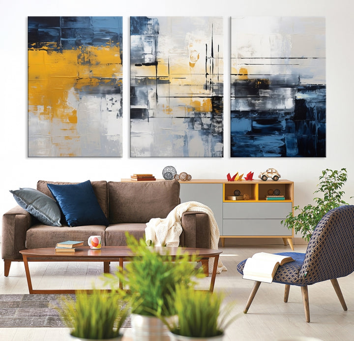 The Yellow Orange Blue Abstract Wall Art Print on gallery-wrapped, museum-quality canvases adds a vibrant touch to the room.