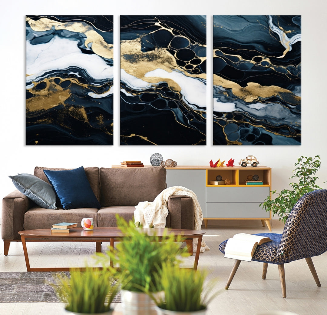 Fluid Marble Abstract Wall Art Print, a contemporary piece with black, white, and gold swirls on museum-quality canvas.