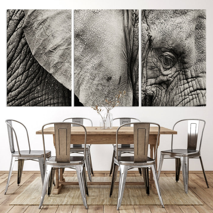 A modern living room features a large Elephant Wall Art Canvas Print in black and white, crafted on museum-quality canvases with UV-protective coating to maintain its elegance.