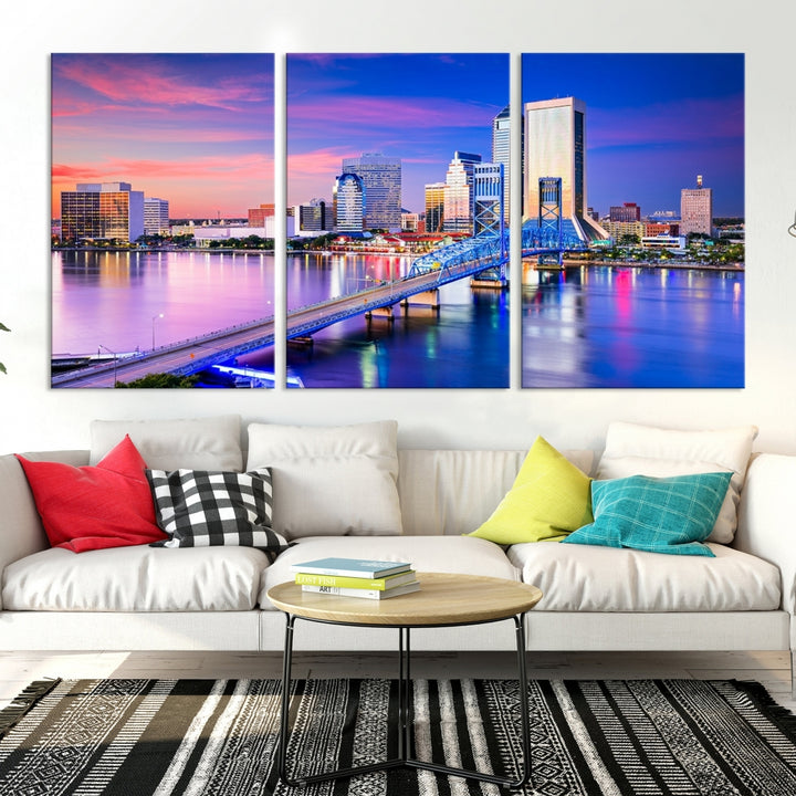 The Jacksonville Wall Art Canvas Print, showcasing the Jacksonville cityscape over a river at sunset, is elegantly crafted on museum-quality canvas with a UV-protective coating. Ready to hang, it elevates your space with its sophisticated charm.