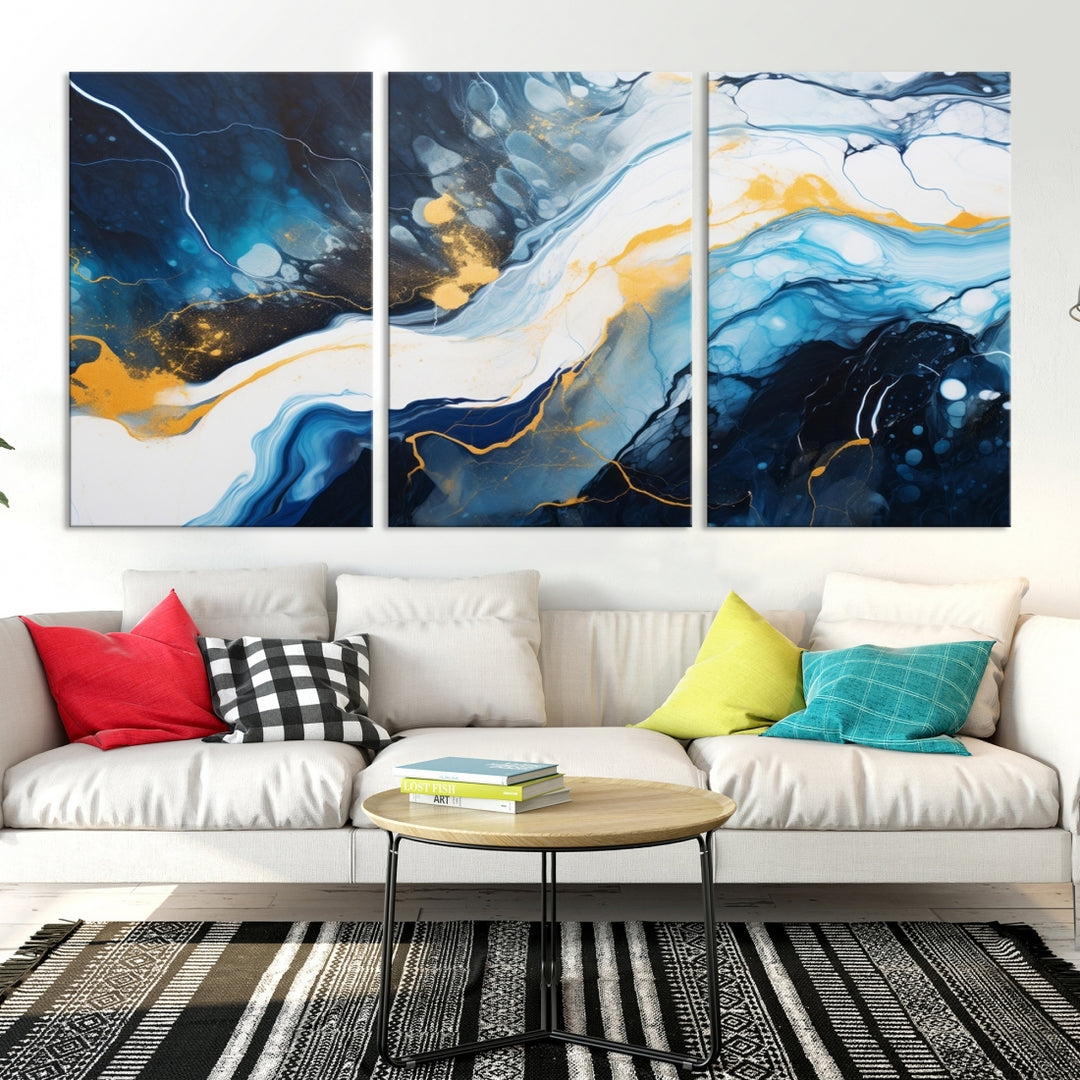 The Navy Blue Abstract Wall Art Canvas Print, displaying an exquisite array of blue, white, and gold swirls, is crafted on museum-quality canvas and enhances the space with its sophisticated elegance.