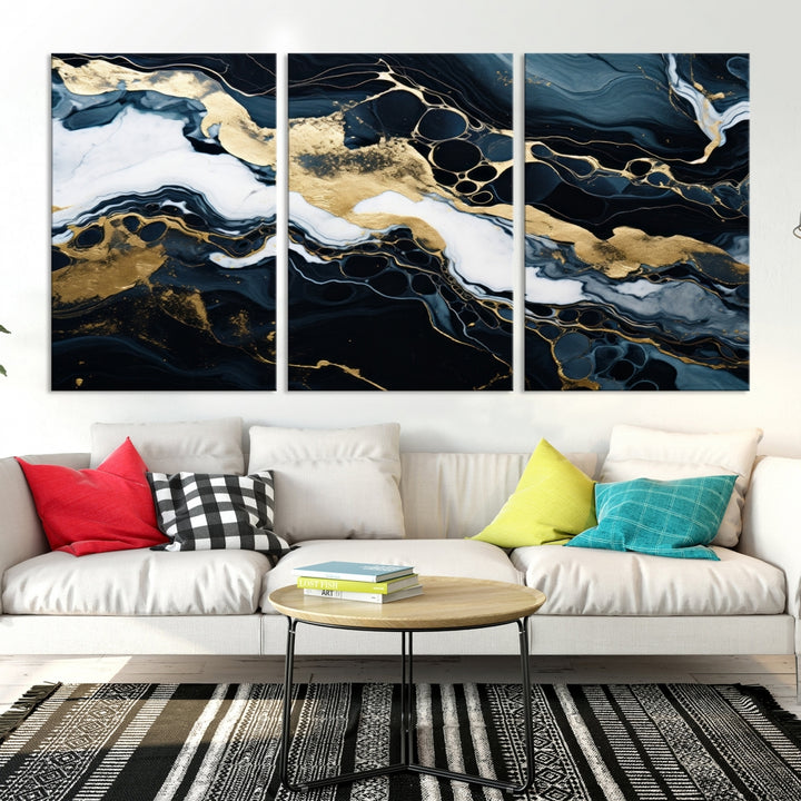 Fluid Marble Abstract Wall Art Print, a contemporary piece with black, white, and gold swirls on museum-quality canvas.