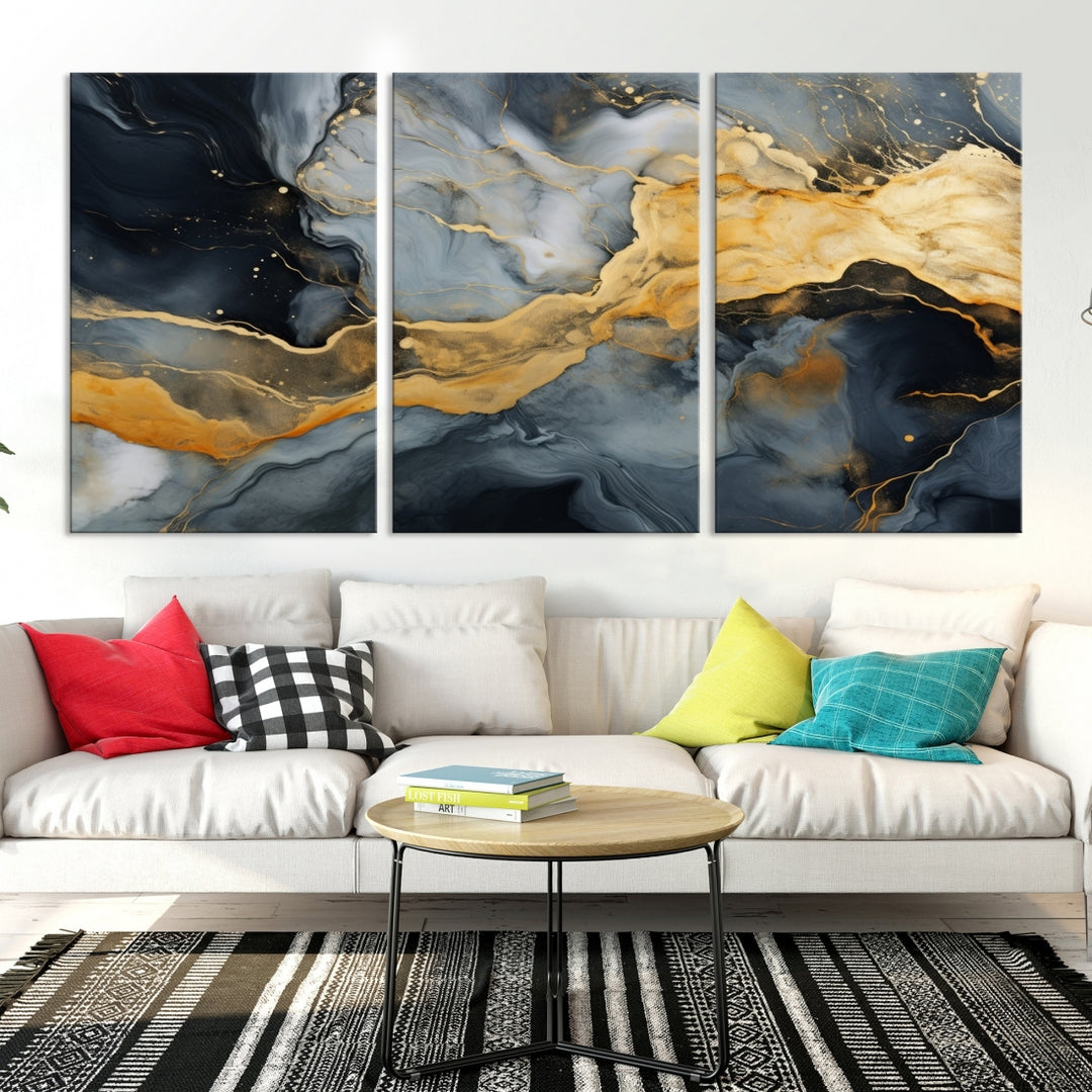 The living room features the Golden Gray Abstract Wall Art Print Contemporary Art Canvas Design, a triptych showcasing gold, black, and gray swirls. Crafted on museum-quality canvas and ready to hang, this piece is designed for elegance and durability.