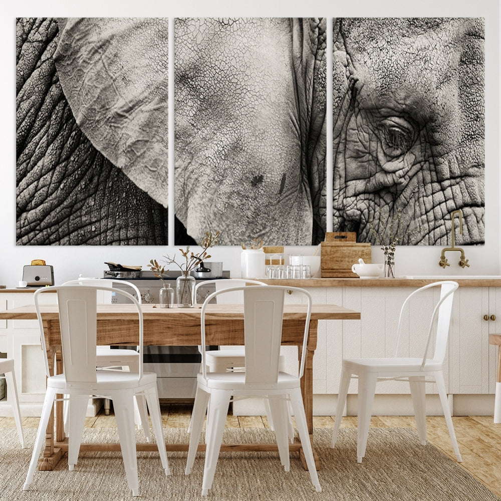 A modern living room features a large Elephant Wall Art Canvas Print in black and white, crafted on museum-quality canvases with UV-protective coating to maintain its elegance.