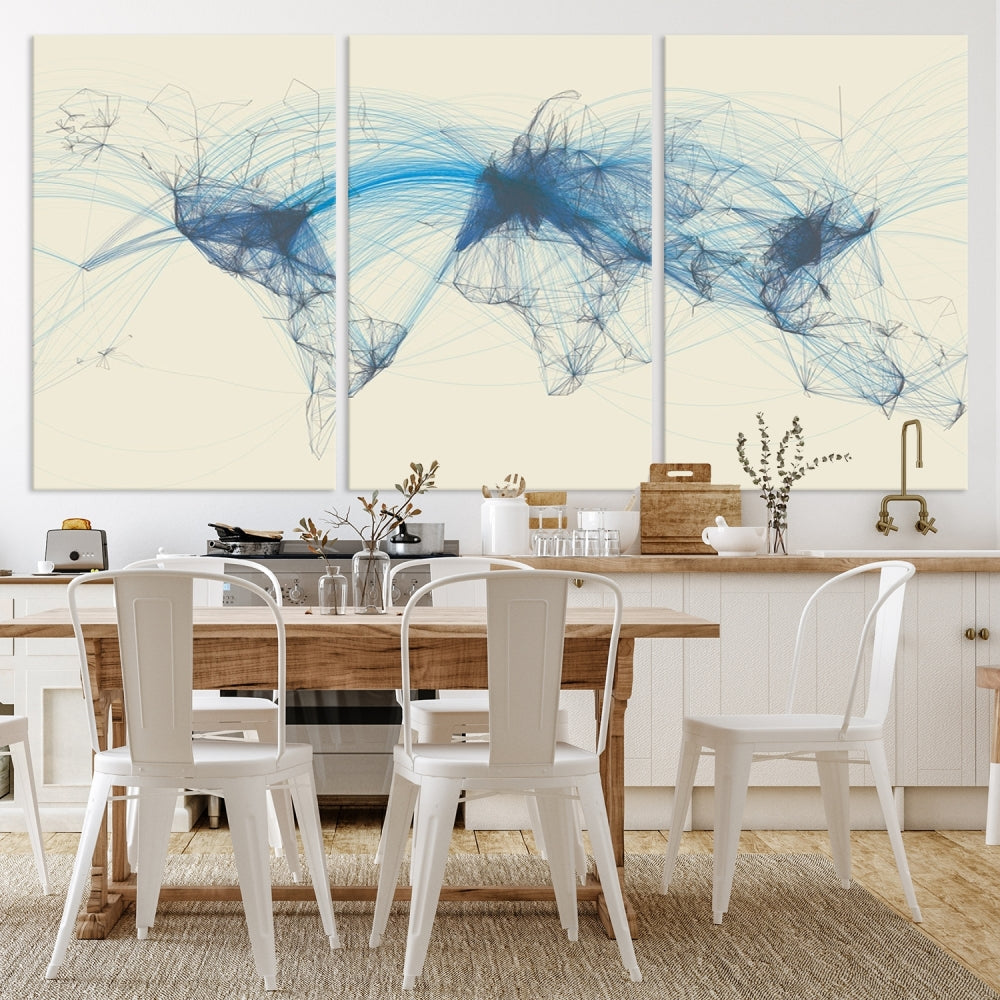 The Flight Routes Map art, featuring an abstract world map with blue connections representing global networks, is a three-panel canvas wall art piece.