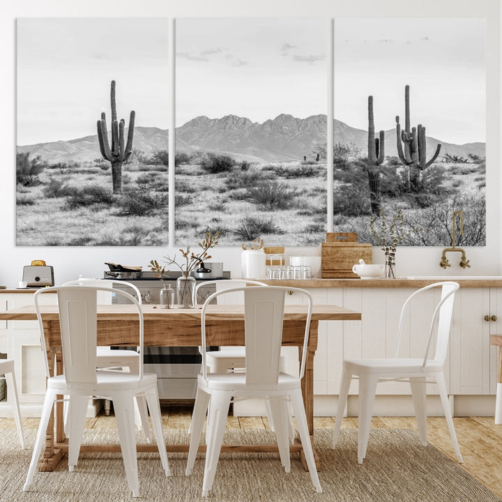 The modern living room showcases the "Black White Arizona Desert Canvas Wall Art Cactus Farmhouse Wall Art," a triptych consisting of gallery-wrapped, museum-quality black-and-white desert landscape photographs featuring cacti.