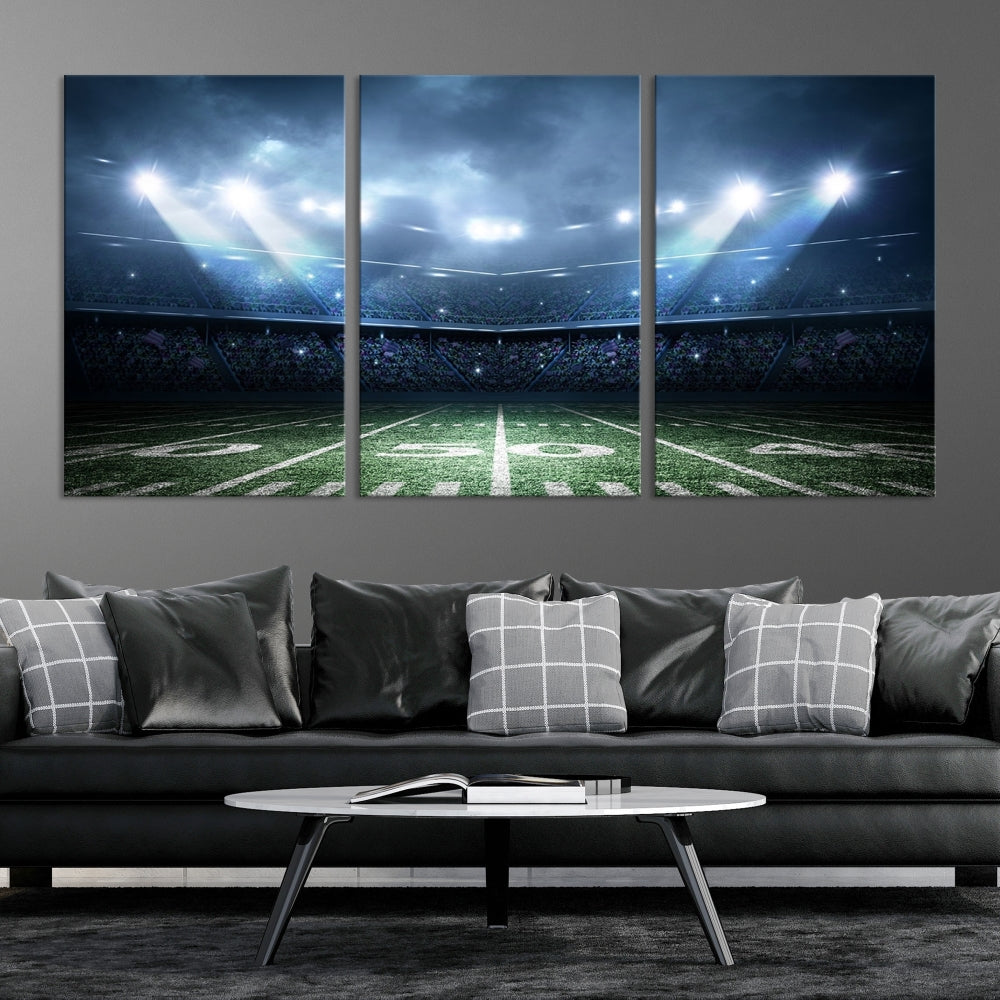 The *American Football Stadium Wall Art Canvas Print*, showcasing a lit football stadium, hangs prominently.