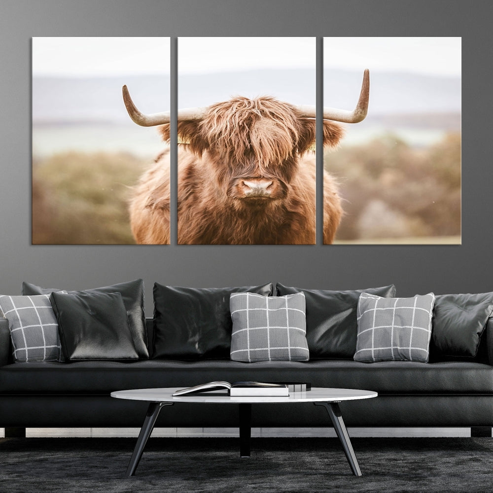 Canvas wall art featuring a Highland cow with long, shaggy fur in natural pastel tones, ready to hang.