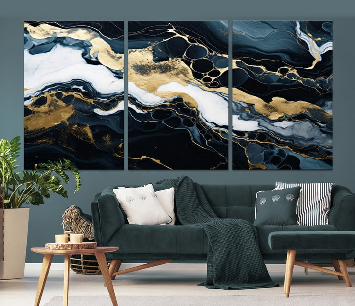 Fluid Marble Abstract Wall Art Print, a contemporary piece with black, white, and gold swirls on museum-quality canvas.