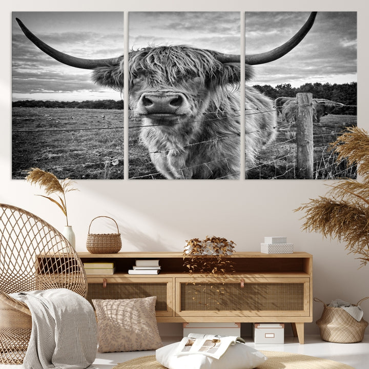 The "Scottish Highland Cow Canvas Wall Art Farmhouse Decor" adds a touch of rustic charm to your living room wall above the couch.