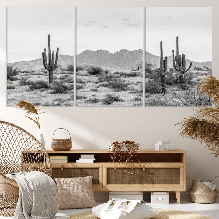 The modern living room showcases the "Black White Arizona Desert Canvas Wall Art Cactus Farmhouse Wall Art," a triptych consisting of gallery-wrapped, museum-quality black-and-white desert landscape photographs featuring cacti.