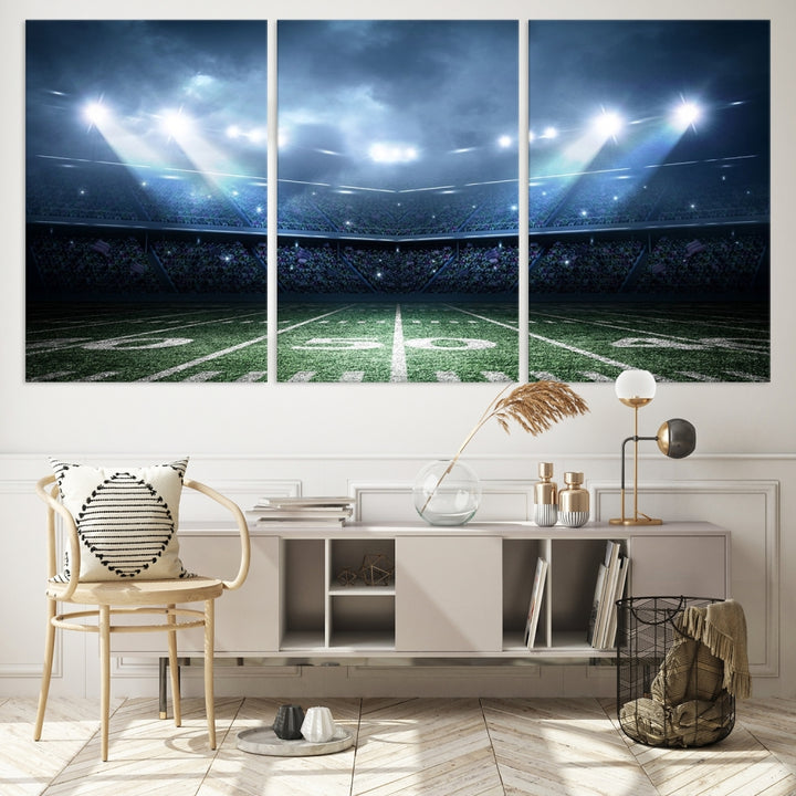 The *American Football Stadium Wall Art Canvas Print*, showcasing a lit football stadium, hangs prominently.