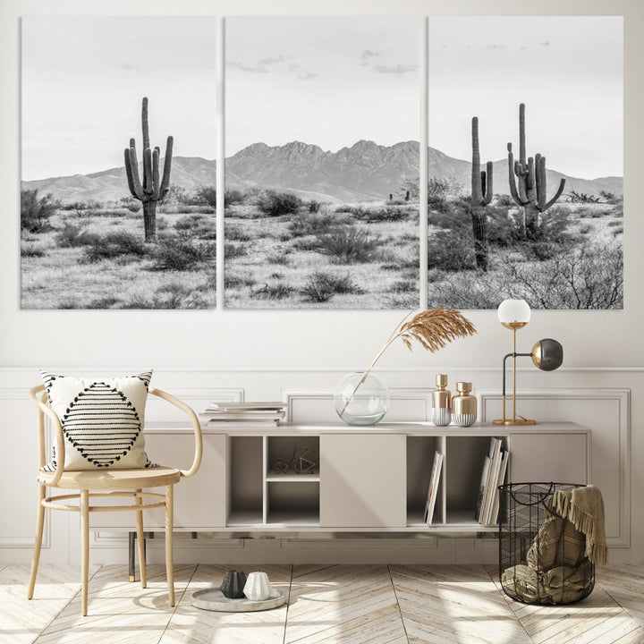 The modern living room showcases the "Black White Arizona Desert Canvas Wall Art Cactus Farmhouse Wall Art," a triptych consisting of gallery-wrapped, museum-quality black-and-white desert landscape photographs featuring cacti.