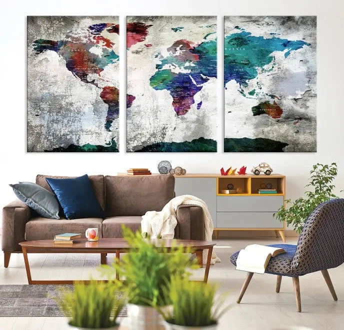 A three-panel World Map Wall Art Canvas Print, crafted with museum-quality materials, adorns the wall.