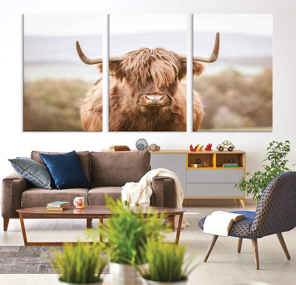 Canvas wall art featuring a Highland cow with long, shaggy fur in natural pastel tones, ready to hang.