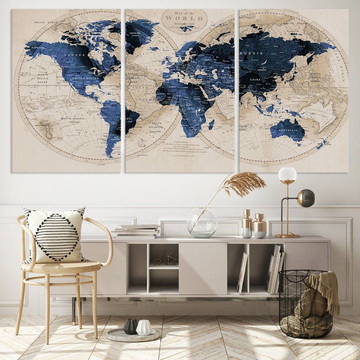 The Vintage Triptych Map Print is a grunge-stained blue and beige world map, perfect for enhancing wall decor.